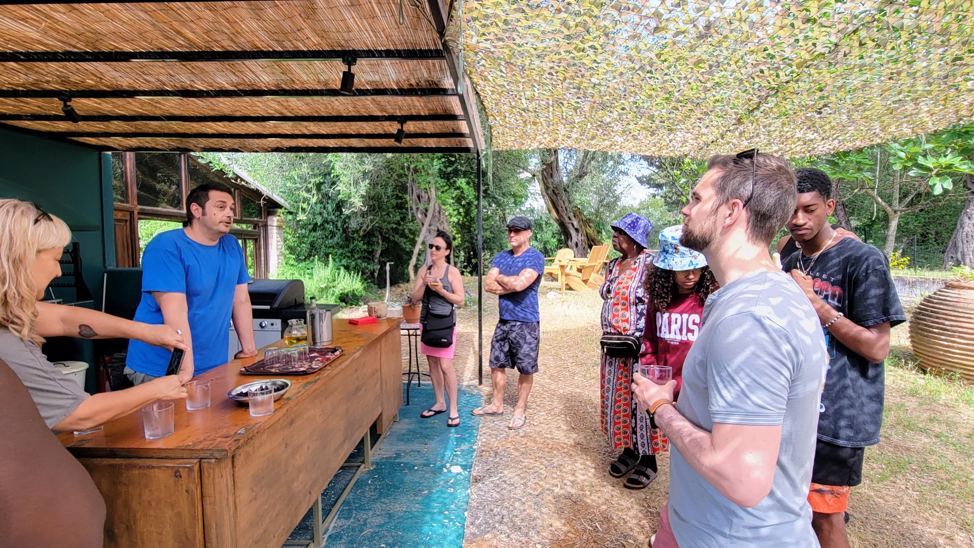 A group enjoying a wine tasting experience — the kind of curated activity an advisor arranges for group trips
